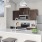 a kitchen with a white counter top and a white refrigerator