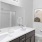 a bathroom with a large mirror